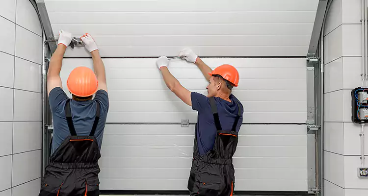 Garage Door Bottom Panel Repair in Bellview, FL